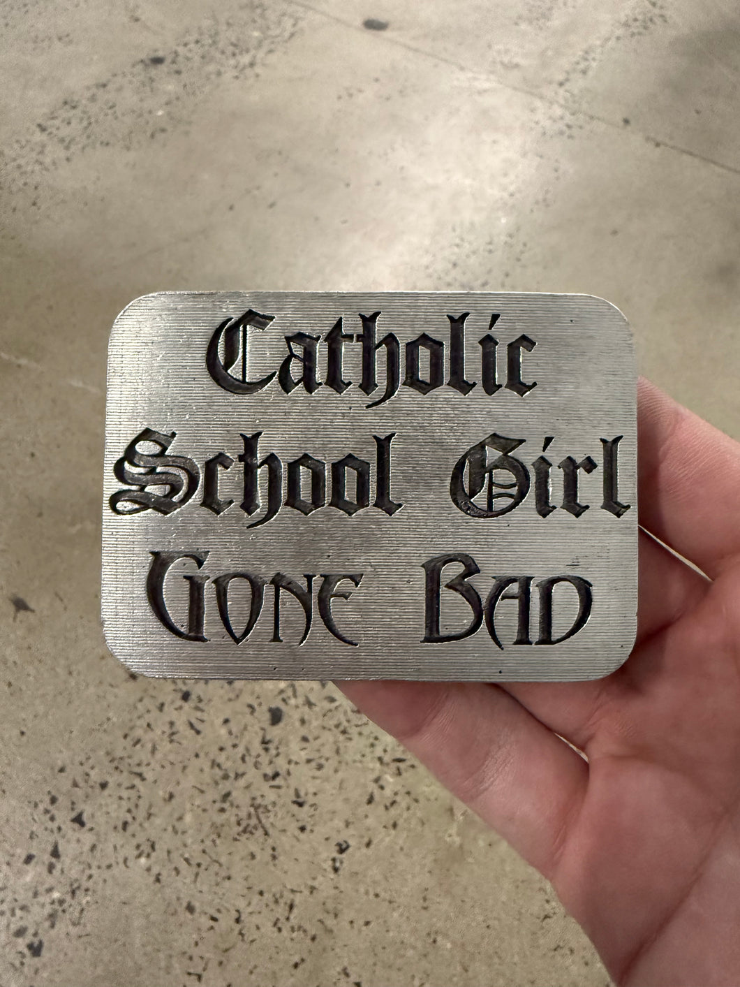 2005 Catholic School Girl Gone Bad Belt Buckle